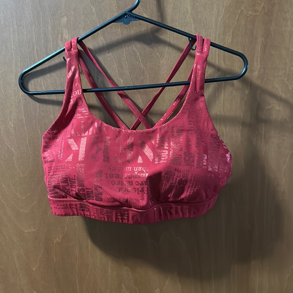 Red patterned Lululemon sports bra. Size 10 (I think). EUC.